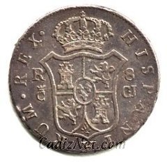 Cadiz:Moneda de 8 reales de Fernando VII acuñada en 1813. Durante la Guerra de la Independencia, Cádiz acuñó monedas en los talleres del actual Instituto Valcárcel. La Ceca de Cádiz es la letra C coronada, simbolizando que la ciudad era sede de los representantes de la soberanía nacional. (Colección particular)